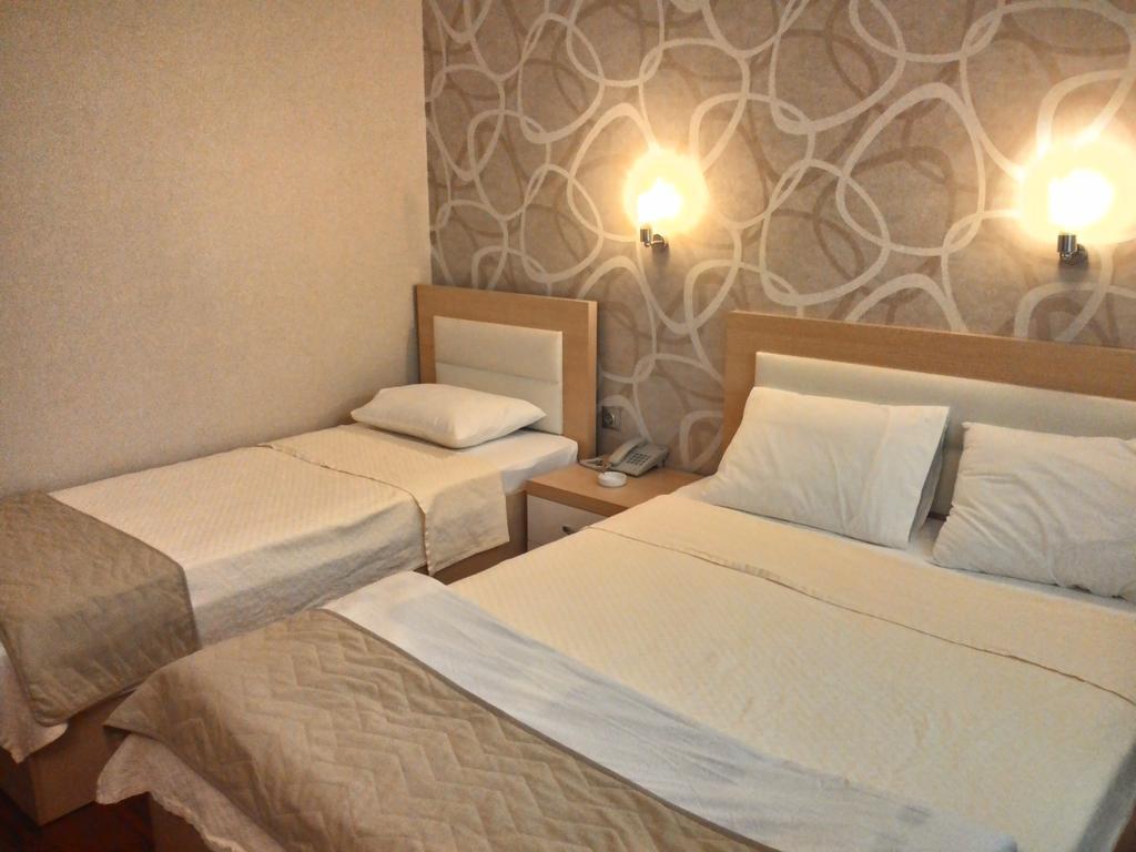 Guney Adana Otel Chambre photo